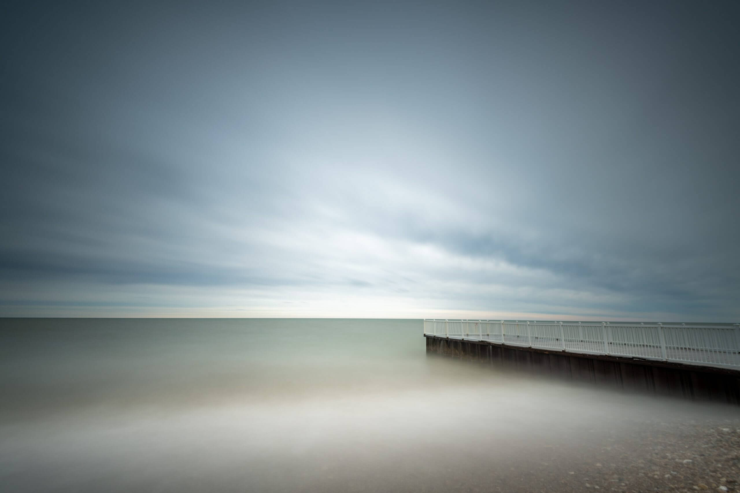 Jetty at beach scene