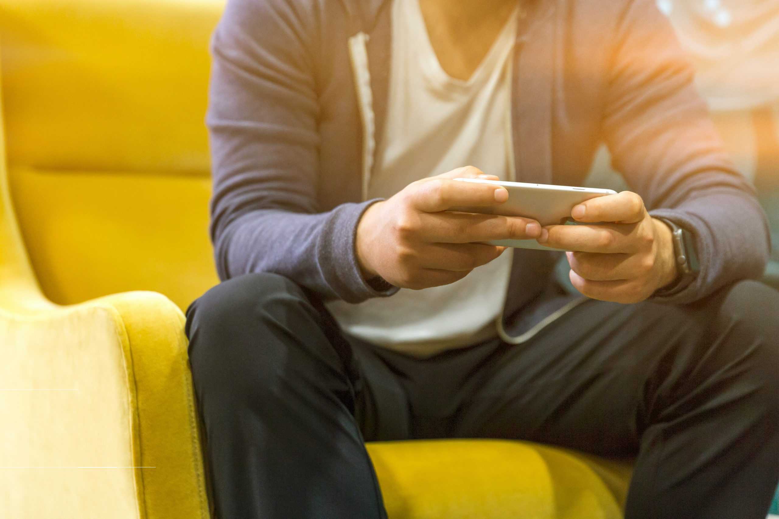 Man reading mobile phone